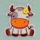 Little cow with a flower