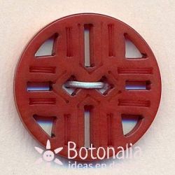 Classic round button carved with straight geometric design.