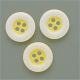 Round classic button in yellow with white edge